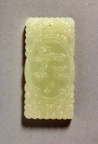A GOOD CHINESE CARVED PALE JADE PENDANT, with carved decoration of immortals and elephants amongst