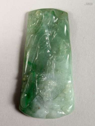 A GOOD CHINESE CARVED JADE PENDANT, carved one side to depict a landscape, 6.3cm wide.