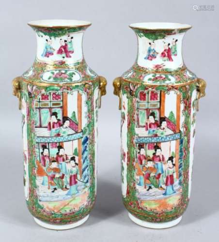 A PAIR OF 19TH CENTURY CHINESE CANTON FAMILLE ROSE PORCELAIN VASES, the vases decorated with