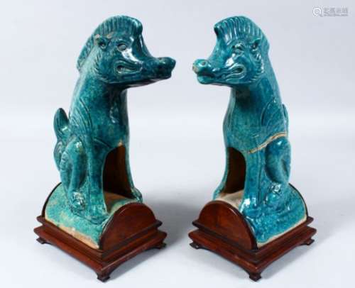 A GOOD PAIR OF CHINESE MING DYNASTY / STYLE TURQUOISE GLAZE POTTERY ROOF TILES ON STANDS, the