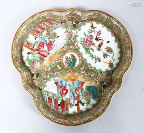 A 19TH CENTURY CHINESE CANTON FAMILLE ROSE PORCELAIN MOULDED DISH, the body of the dish decorated