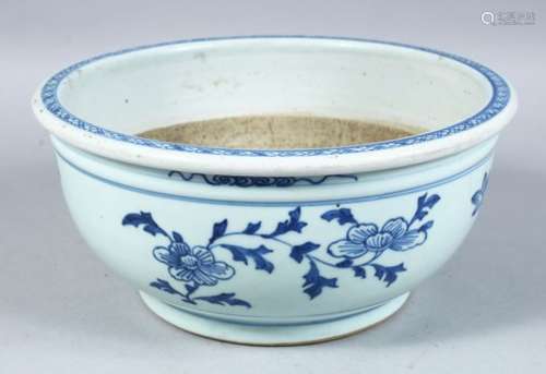 A GOOD CHINESE TRANSITIONAL PERIOD BLUE & WHITE PORCELAIN JARDINIERE, the body decorated with scenes