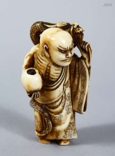 A GOOD JAPANESE MEIJI PERIOD CARVED IVORY NETSUKE OF CHINNAN SENNIN, the sennin stood in an