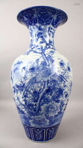 A LARGE 19TH CENTURY JAPANESE BLUE & WHITE PORCELAIN VASE, the body of the vase decorated with to