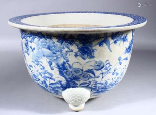 A GOOD 19TH CENTURY JAPANESE BLUE & WHITE PORCELAIN JARDINIERE, the body of the pot decorated with