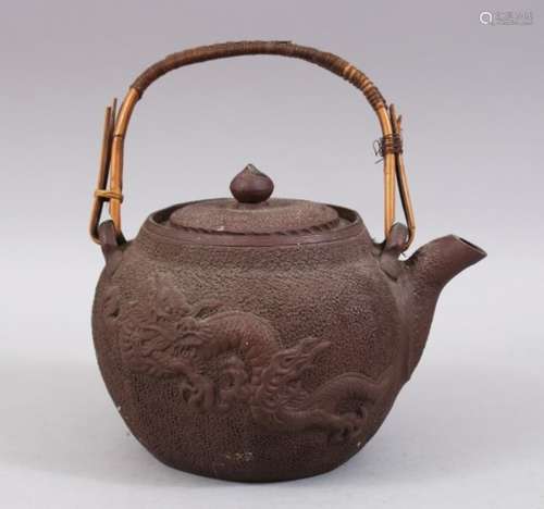 A JAPANESE MEIJI PERIOD MOULDED CLAY / YIXING STYLE DRAGON TEAPOT / KETTLE, the body with nanako