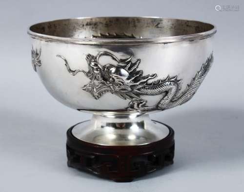 A GOOD 19TH CENTURY CHINESE SOLID SILVER DRAGON BOWL & STAND, the body of the bowl decorated with