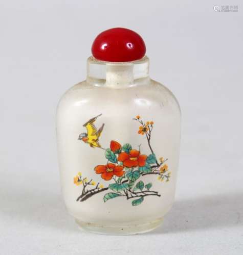 A GOOD 19TH / 20TH CENTURY CHINESE REVERSE PAINTED GLASS SNUFF BOTTLE, depicting scenes of flora and