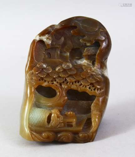 A GOOD 19TH CENTURY CHINESE CARVED JADE LANDSCAPE PEBBLE, the pebble carved in great detail to