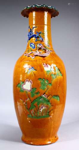 A LARGE 19TH CENTURY CHINESE FAMILLE ROSE BISCUIT GROUND PORCELAIN VASE, the body of the vase with a