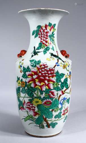 A CHINESE 19TH CENTURY REPUBLIC TWIN HANDLE FAMILLE ROSE PORCELAIN VASE, the vase decorated with