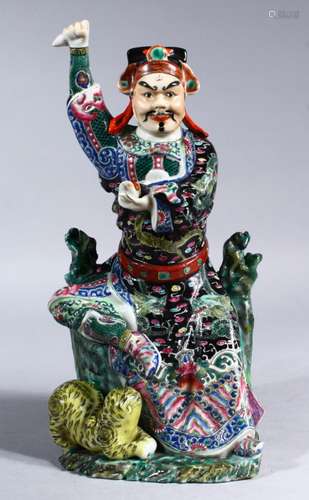 A GOOD 19TH / 20TH CENTURY CHINESE FAMILLE ROSE / VERTE PORCELAIN FIGURE OF AN IMMORTAL & TIGER. the