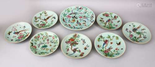 EIGHT 19TH CENTURY CHINESE CANTON CELADON PORCELAIN PLATES, each decorated in a similar way to