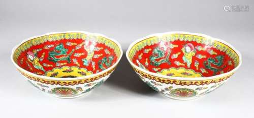 TWO 19TH / 20TH CENTURY CHINESE FAMILLE VERTE DRAGON BOWLS, the interior of the bowls decorated with