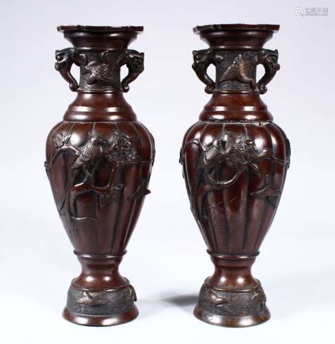 A PAIR OF JAPANESE MEIJI PERIOD BRONZE TWIN HANDLE VASES, the vases with decoration in relief