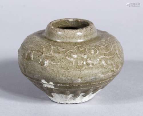 A SMALL 16TH CENTURY OR EARLIER CHINESE CELADON JAR, the body of the jar ith relief decoration,