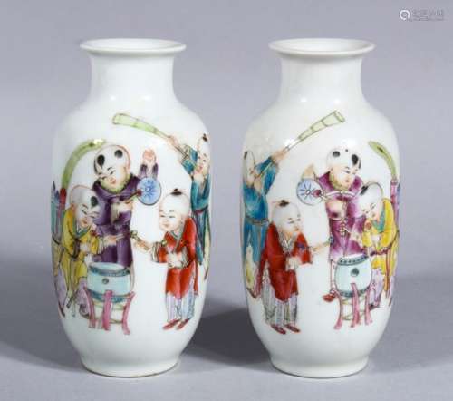 A PAIR OF EARLY 20TH CENTURY CHINESE PORCELAIN VASES OF BOYS, the body decorated with scenes o