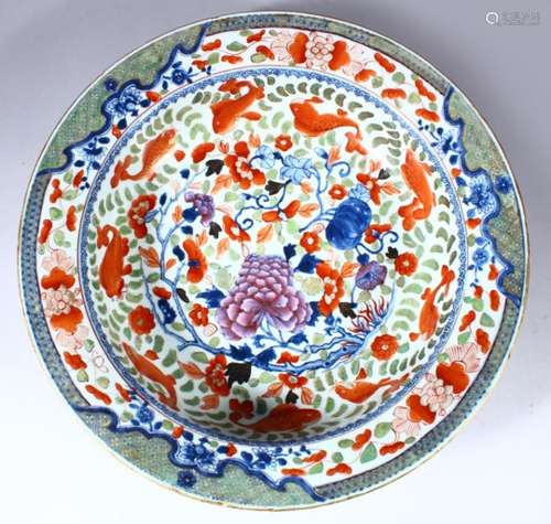 A LARGE 19TH CENTURY CHINESE FAMILLE ROSE PORCELAIN GOLDFISH DEEP DISH, the interior of the dish