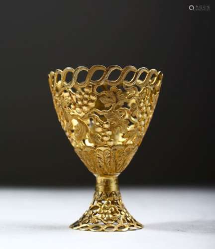 A FINE 19TH CENTURY GILT METAL SWISS ZARF CUP, made for the Ottoman market, with pierced grape and