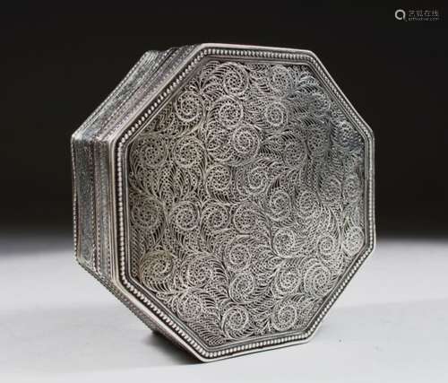 A FINE INDIAN 19TH/20TH CENTURY OCTAGONAL SHAPED FILIGREE SILVER BOX, with hinged cover, 12cm wide.