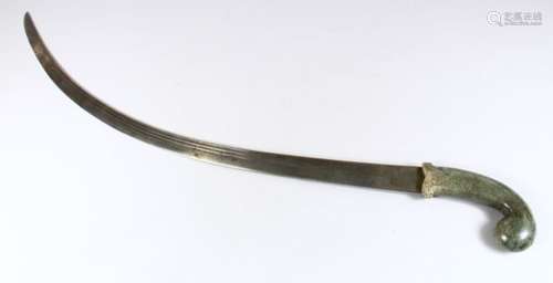 AN 18TH/19TH CENTURY INDIAN SWORD WITH CARVED HARDSTONE HILT, and fullered curving single-edged