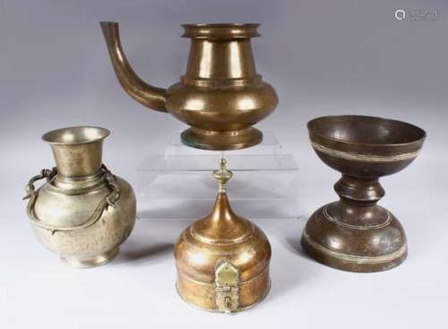 AN 18TH/19TH CENTURY INDIAN METAL EWER, and three other items of metalware, various sizes.