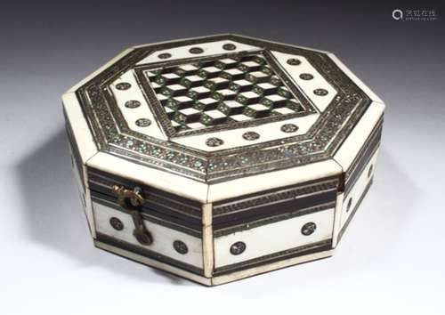 AN ANGLO INDIAN BONE AND INLAID OCTAGONAL SHAPED BOX AND COVER, 13.5cm diameter.