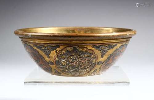 A SMALL SYRIAN BRONZE CIRCULAR BOWL, with silver and copper inlaid decoration, 12.5cm diameter.