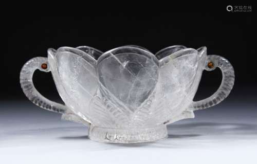 A GOOD CARVED ROCK CRYSTAL TWIN HANDLED BOWL, of lotus leaf design, 15cm wide, in fitted box.