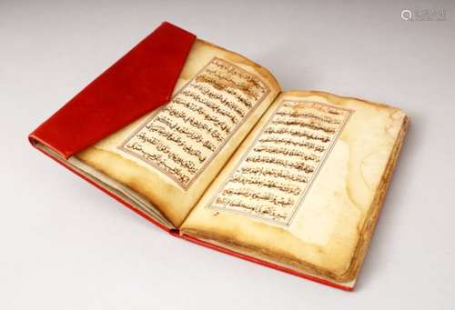 AN EARLY NORTH AFRICAN BOOK OF PRAYER, dated 113, Hijra, in later red leather binding, 18cm x 12cm.