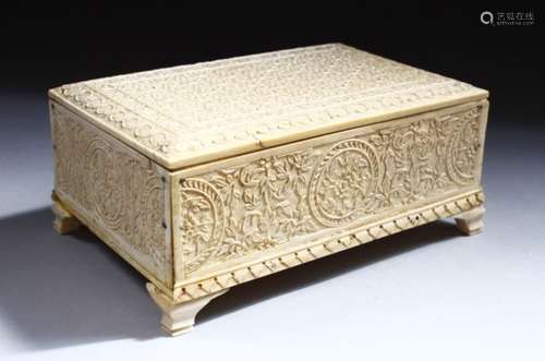 A GOOD LATE 19TH CENTURY IVORY BOX AND COVER, with foliate carved decoration, 17cm wide.