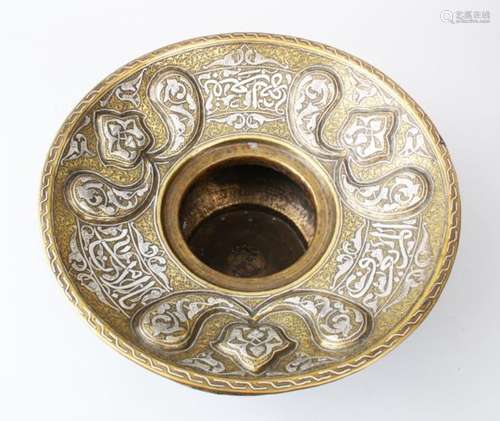 A FINE LATE 19TH CENTURY ISLAMIC DAMASCUS BRASS BASIN, inlaid with silver calligraphy, 32cm