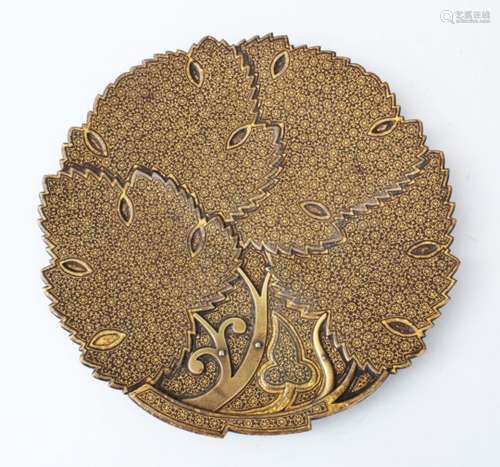 A 19TH CENTURY ISLAMIC INDIAN PUNJAB QAFTEGARI DISH, of stylised leaf form, with inlaid gold and