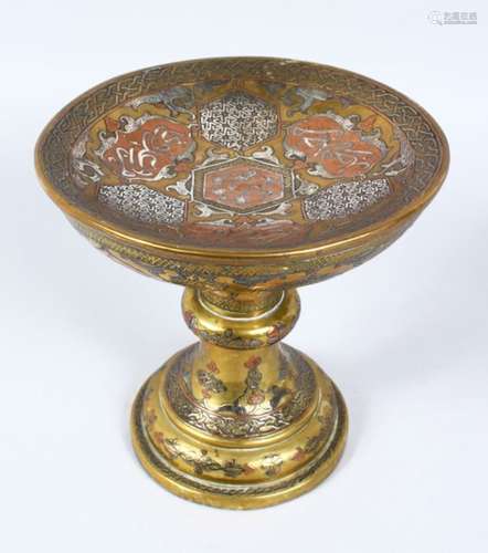 A 19TH CENTURY CAIROWARE BRASS PEDESTAL STAND, inlaid with silver and copper, with calligraphy and