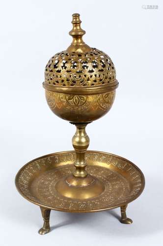 AN EARLY 20TH CENTURY BRASS INCENSE BURNER, with pierced hinged cover, engraved decoration on