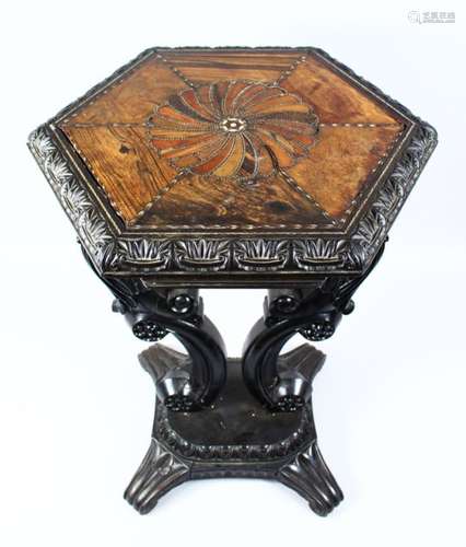 A 19TH CENTURY ANGLO - INDIAN EBONY & EXOTIC WOOD HEXAGONAL TABLE, the top inlaid with a swirl of