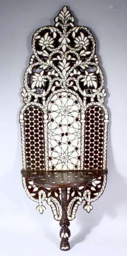 A 19TH CENTURY ISLAMIC CARVED WOOD AND MOTHER OF PEARL WALL HANGING / KAVAKLUK, the carved