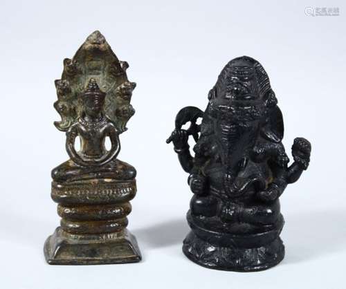 TWO EARLY EASTERN BRONZE FIGURES OF BUDDHA / DEITY, one in the form of an elephant seated on a