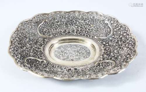 A 19TH CENTURY INDIAN WHITE METAL FILIGREE STYLE DISH, pierced decoration depicting birds and native