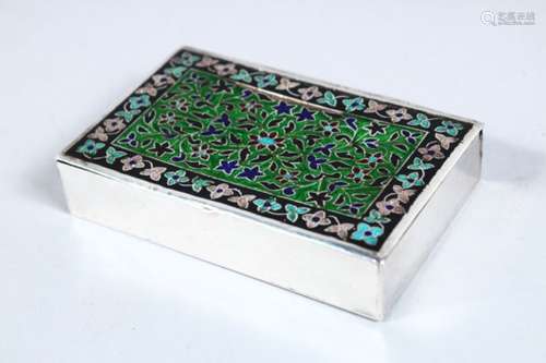 AN INDIAN WHITE METAL & ENAMEL LIDDED BOX, the top with enamel decoration in floral style, 10cm wide