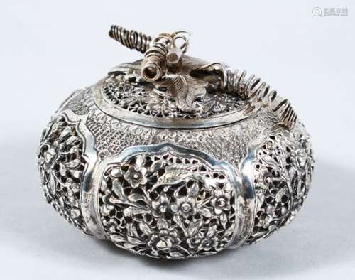 A 19TH CENTURY INDIAN WHITE METAL PIERCED BOX & COVER, with six pierced floral panels, the lid