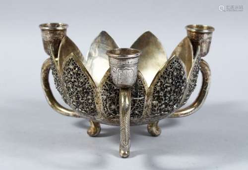 A 19TH CENTURY INDIAN WHITE METAL BOWL / CANDLE HOLDER, with carved panel decoration depicting birds