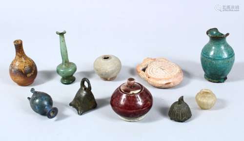 TEN EARLY ISLAMIC / EASTERN POTTERY / BRONZE ITEMS, various sizes. (10)