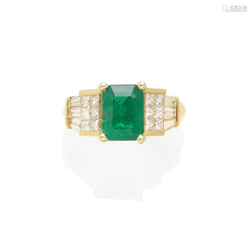 An emerald and diamond ring