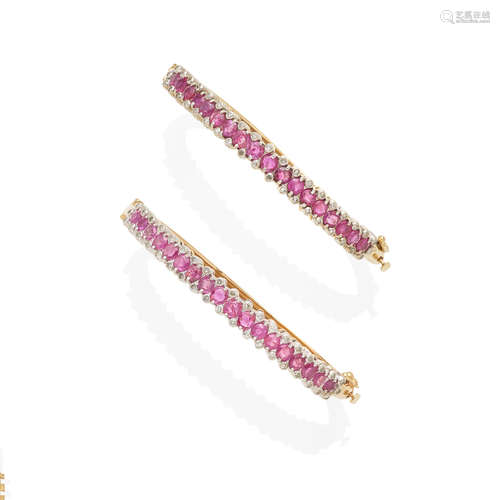 a pair of gold, diamond and ruby bangles