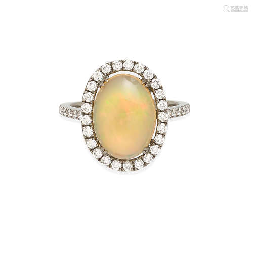 An opal and diamond ring