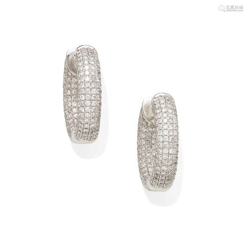 A pair of diamond in/out hoop earrings