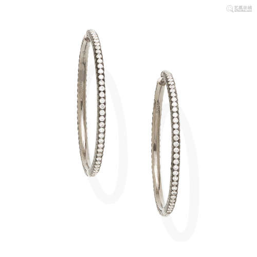 A pair of diamond and colored diamond hoop earrings