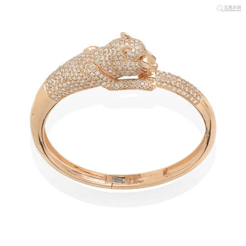 an 18k rose gold and diamond panther bangle