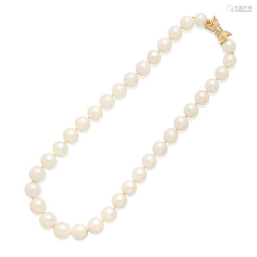 A cultured pearl necklace with diamond clasp